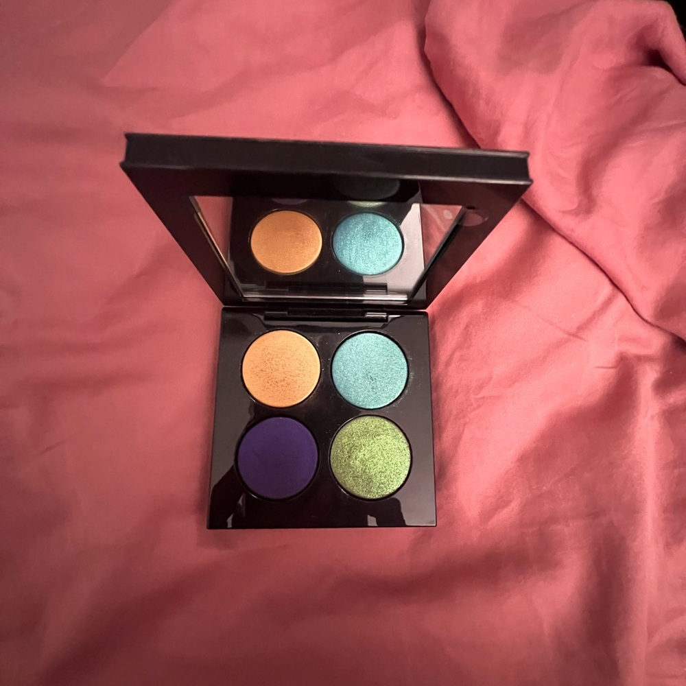 Pat McGrath Eyeshadow Palette with Orange, Teal, Purple, and Green